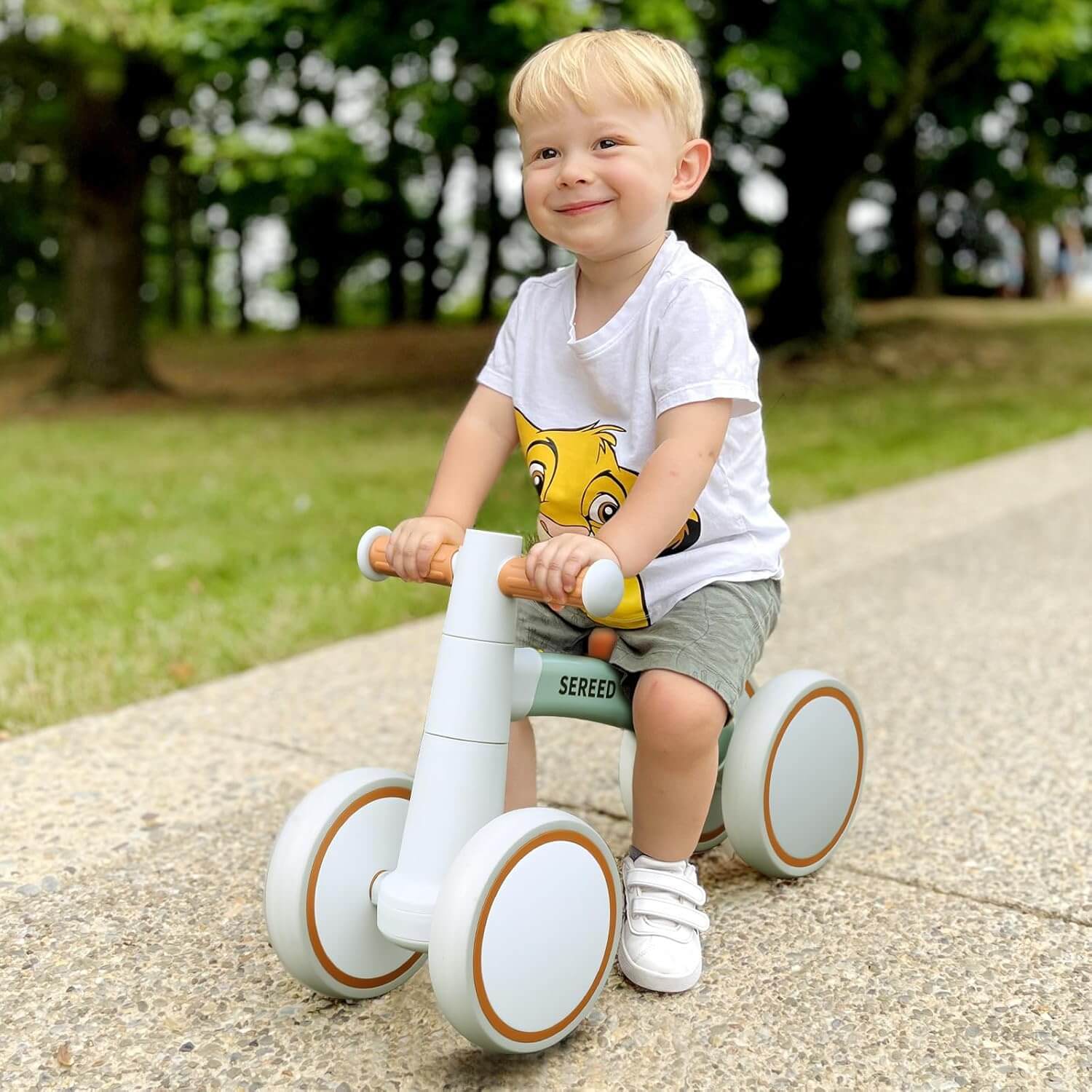 Toddler Balance Bike for Ages 12-24 Months - Four-Wheeled First Bike for Boys and Girls, Ideal First Birthday Gift